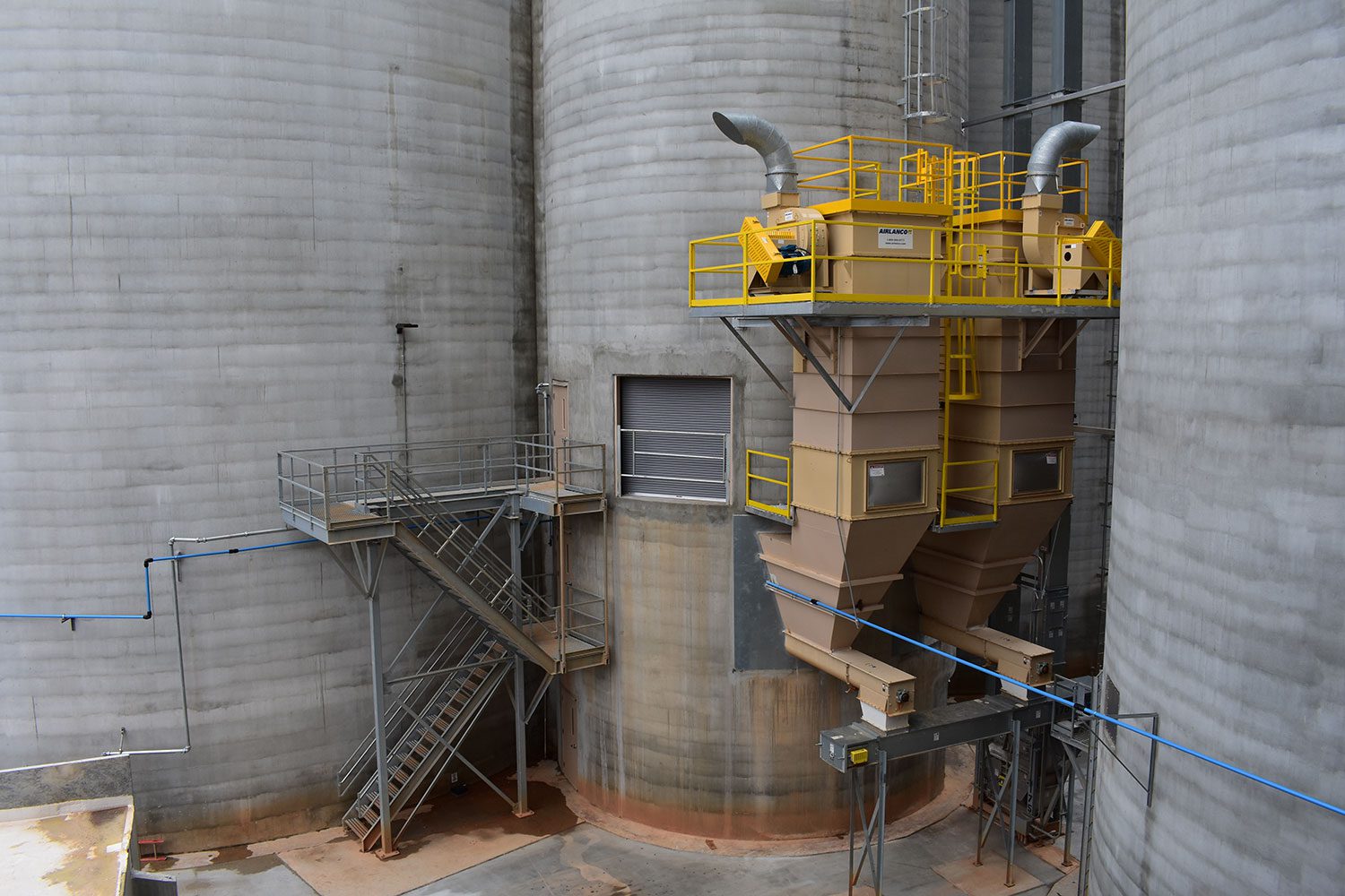 Industrial silos with metal staircases