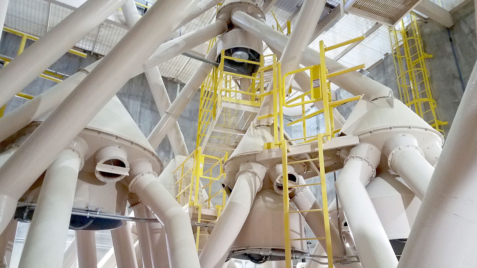 Factory interior with large machinery components