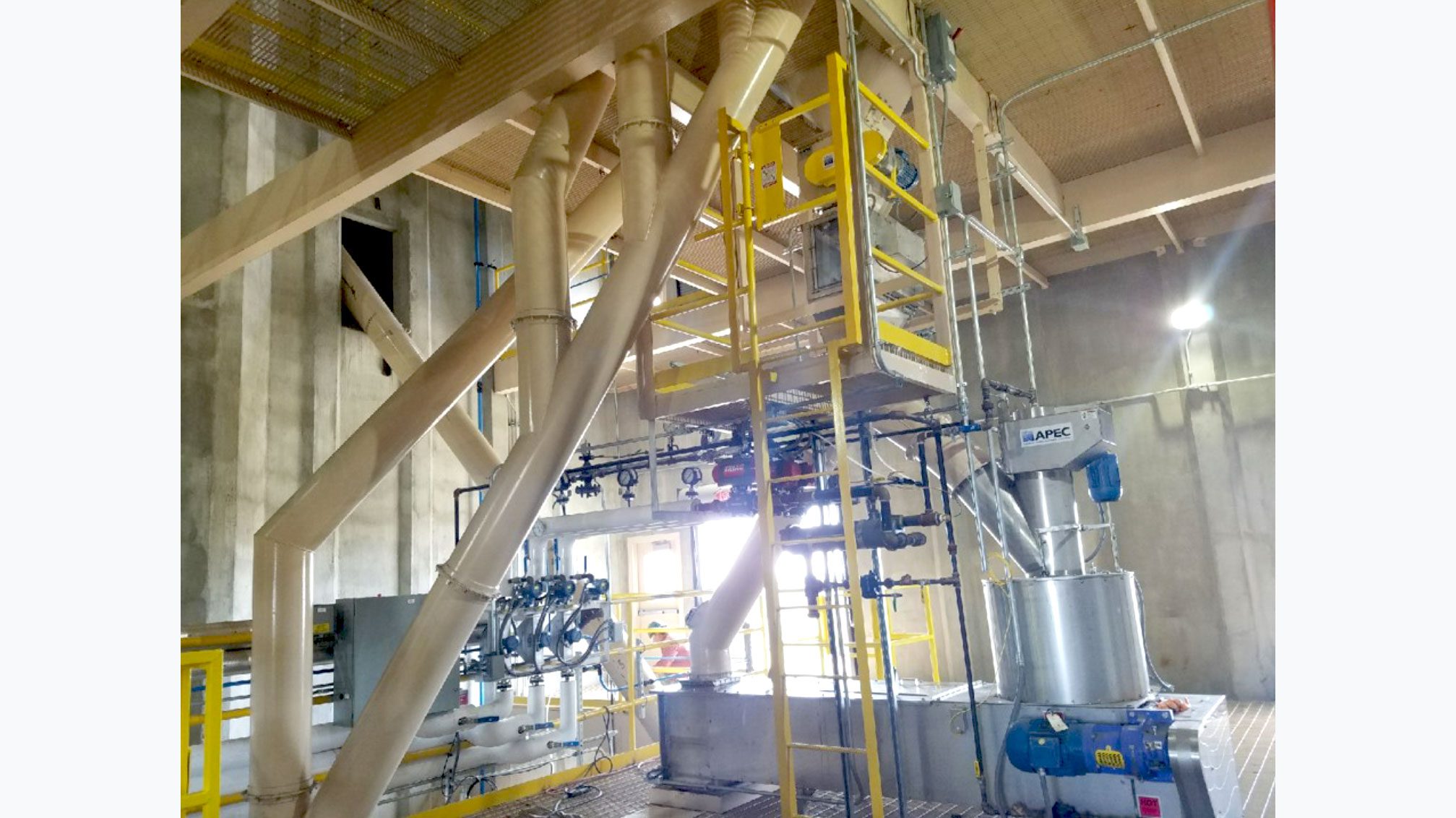Factory interior with complex equipment setup