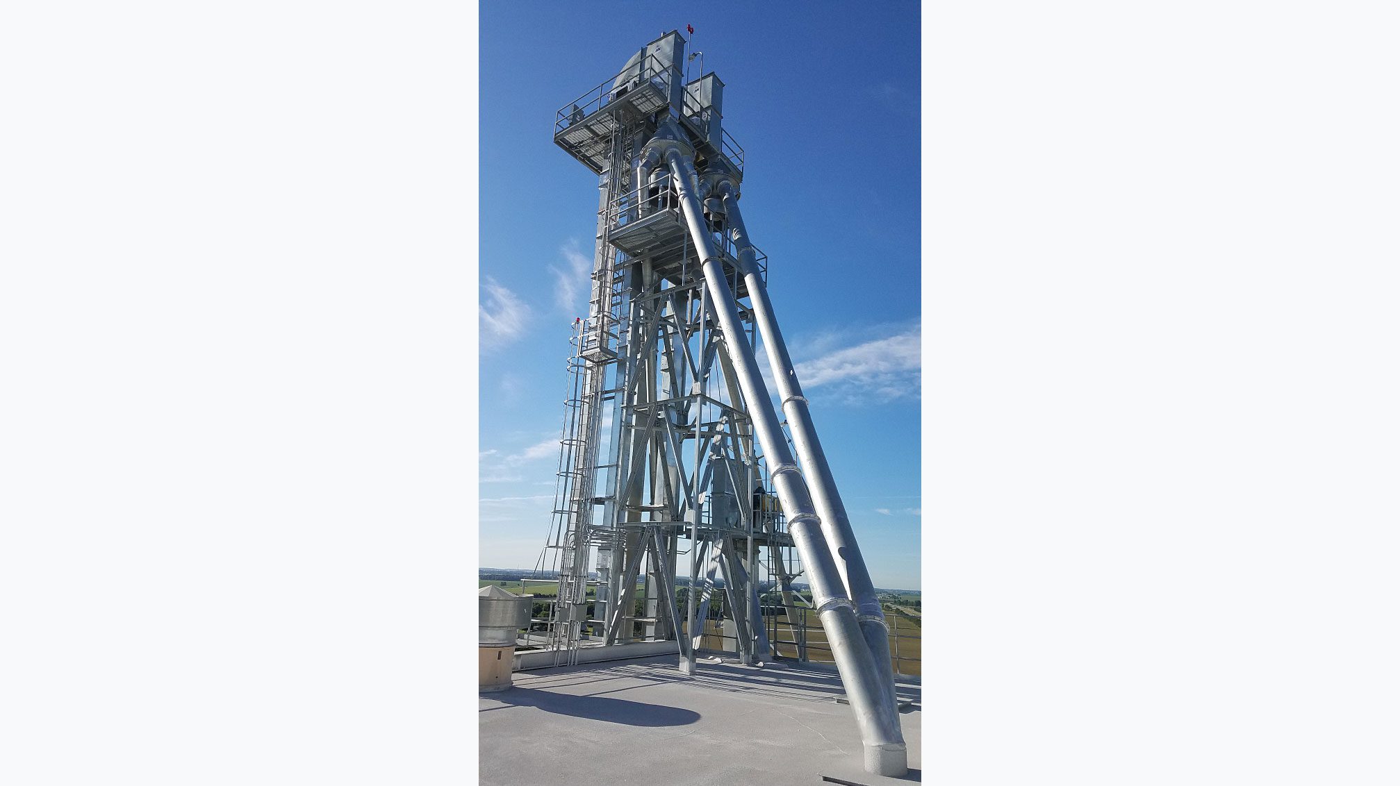 Tall metallic structure with angled support.