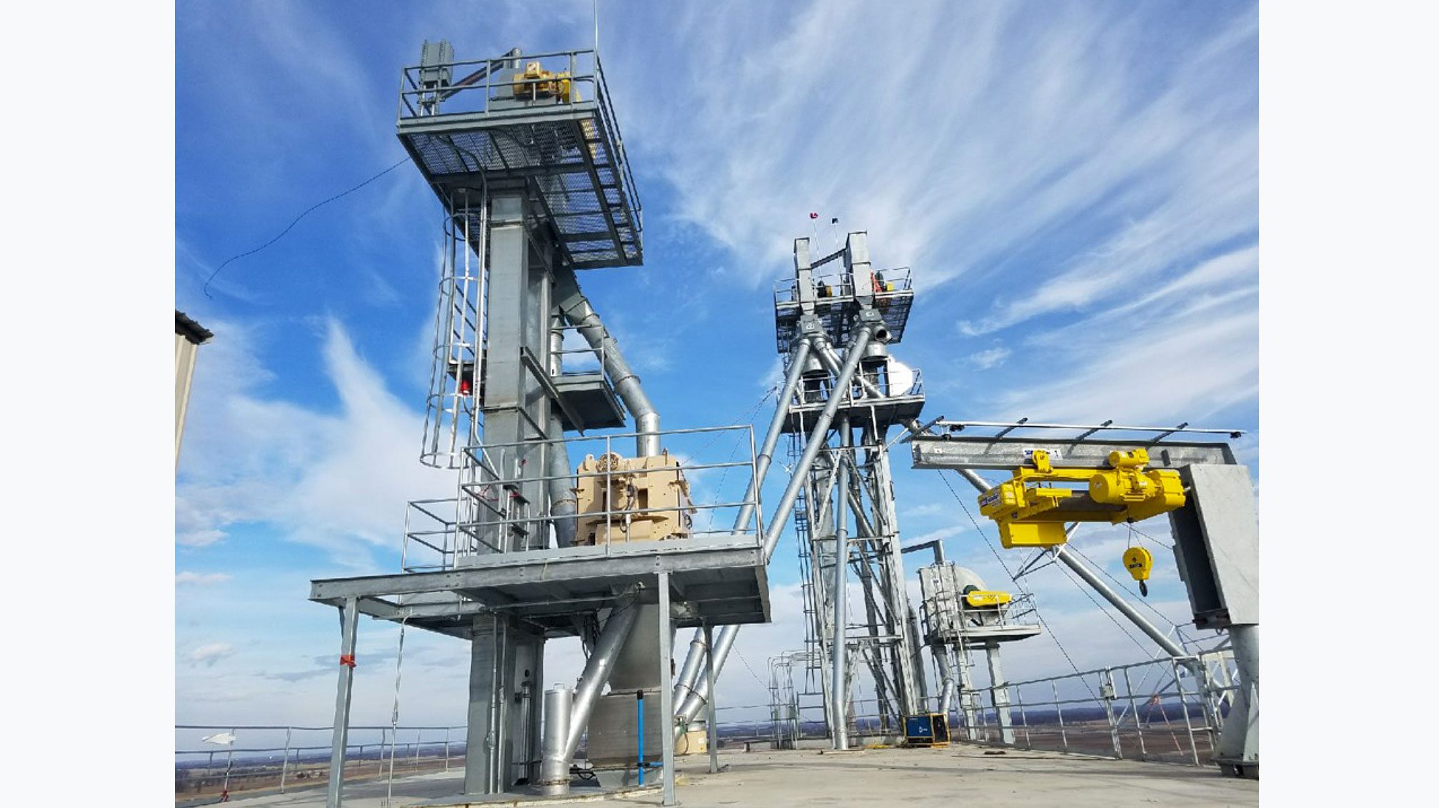 Metal structures with machinery outdoors